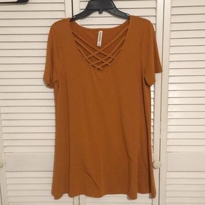 Ladies short sleeve tunic with crisscross bodice